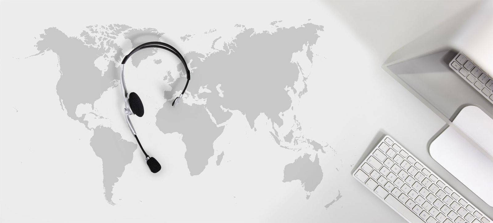 Operations headset on a desk with a world map